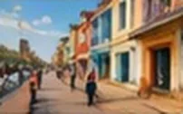 A colorful street with French-style houses